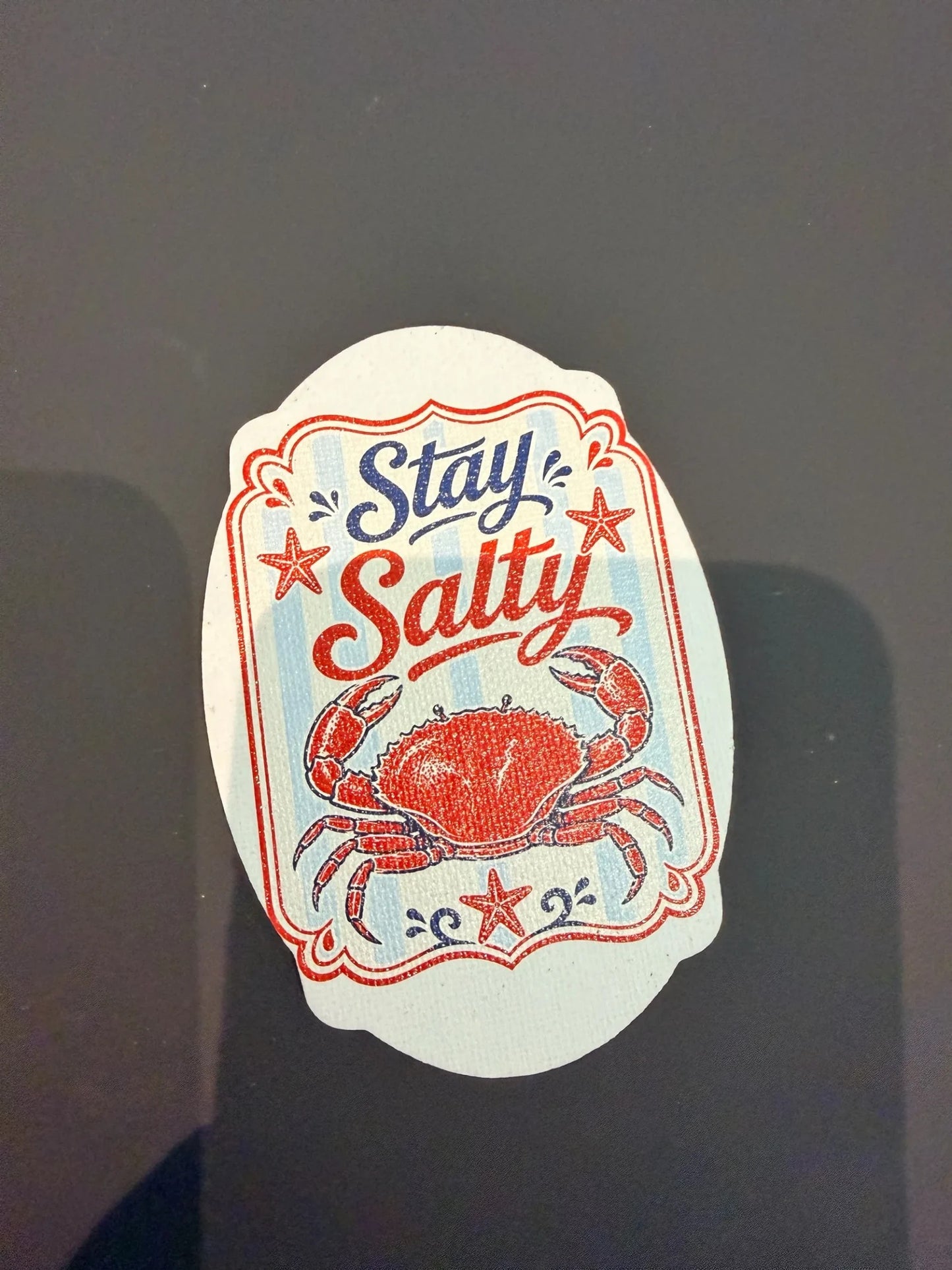 C2 Creative Crafts nautical sticker with red crab, red starfish, and blue stripes saying "Stay Salty".
