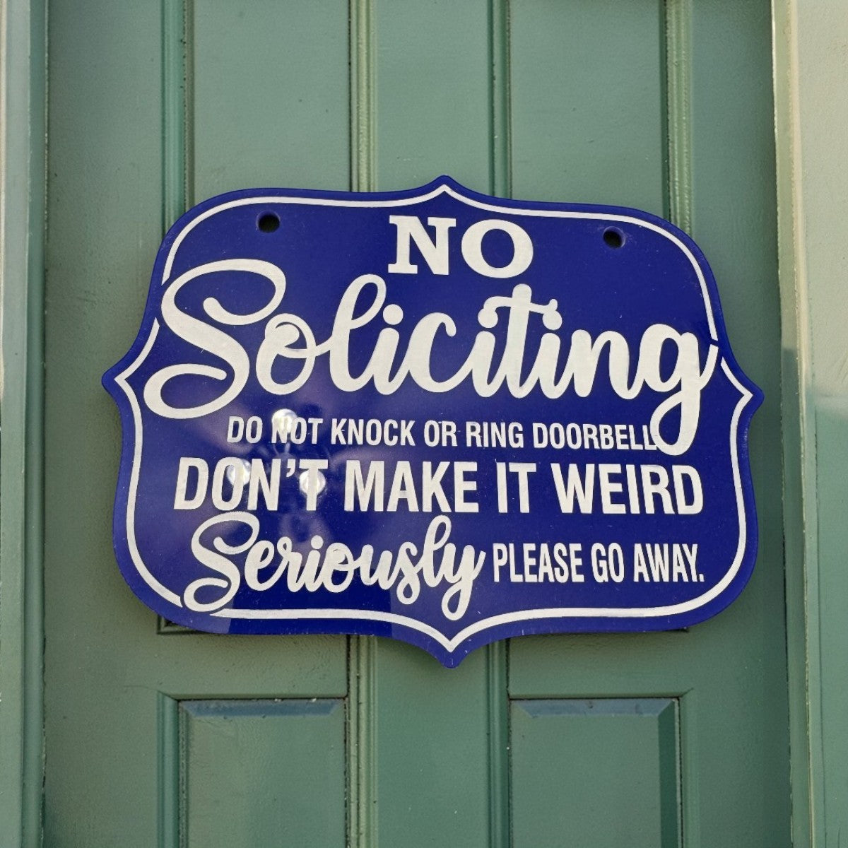 C2 Creative Crafts acrylic no soliciting door sign with white lettering and decorative border. Measures 8" x 6".