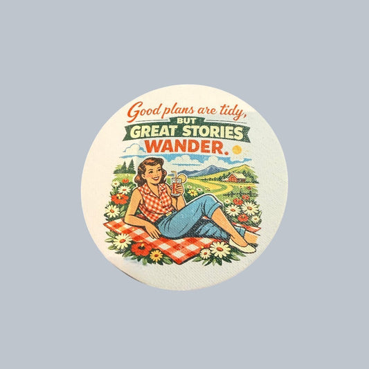 C2 Creative Crafts round decal of a woman in a red plaid shirt and blue jeans enjoying a picnic with a drink.